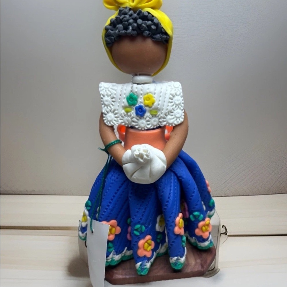 Handcrafted Faceless Doll with Blue Floral Skirt